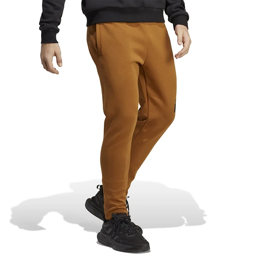 Imagen 2 de 6 de Pantalón adidas Future Icons Badge of Sport-BRONCE/NEGRO