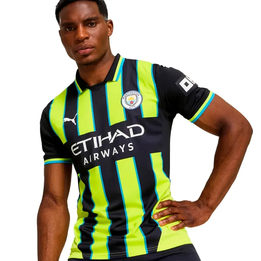 Imagen 0 de 5 de Camiseta Puma Manchester City-NEGRO/VERDE FLUOR