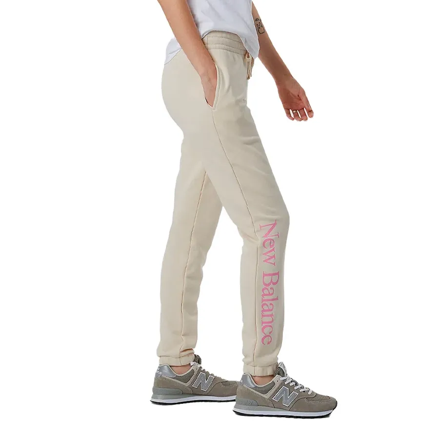 Imagen 1 de 4 de Pantalón New Balance Essentials Celebrate-BEIGE