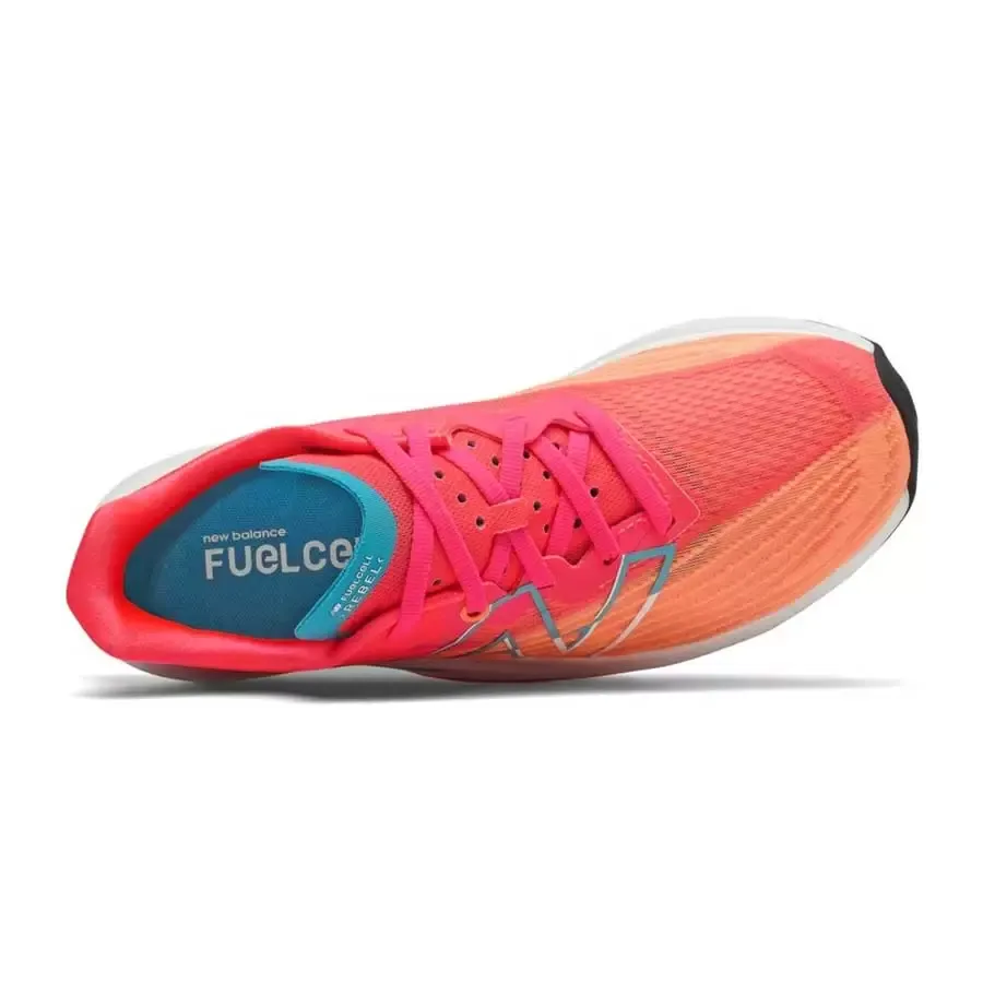 Imagen 2 de 4 de Zapatillas New Balance FuelCell Rebel v2-CORAL/NARANJA