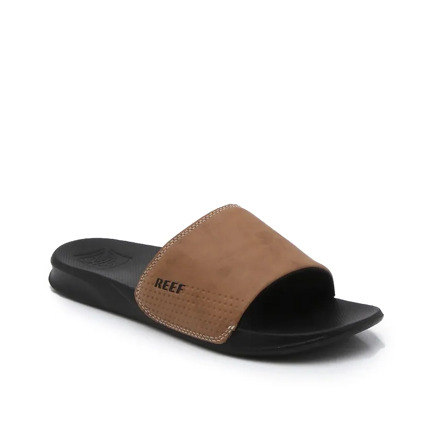 Imagen 1 de 4 de Ojotas Reef Leather Slide Ul-MARRON