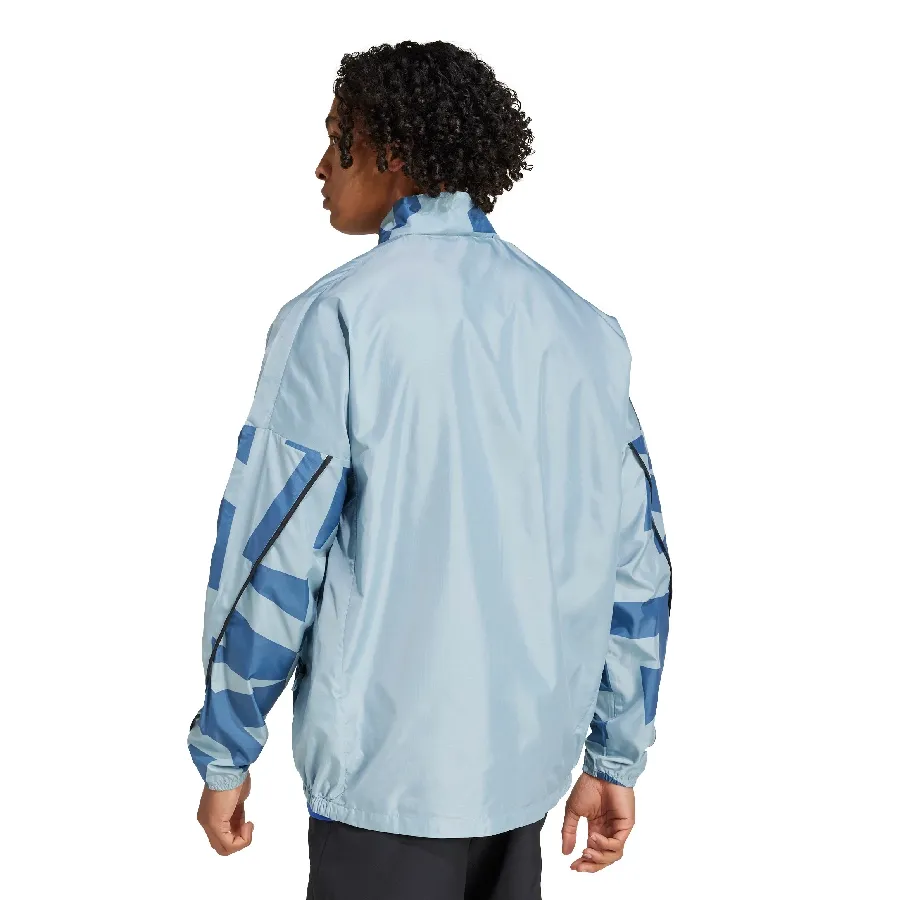 Imagen 2 de 5 de Campera adidas Mt Print Wind J-CELESTE/AZUL