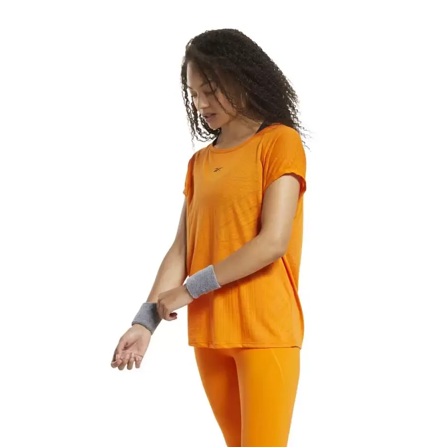 Imagen 0 de 4 de Remera Reebok Ts Burnout-NARANJA