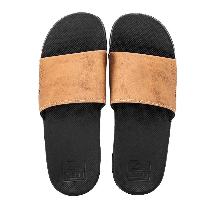 Imagen 4 de 5 de Ojotas Reef Leather Slide Ul-NEGRO/BRONCE